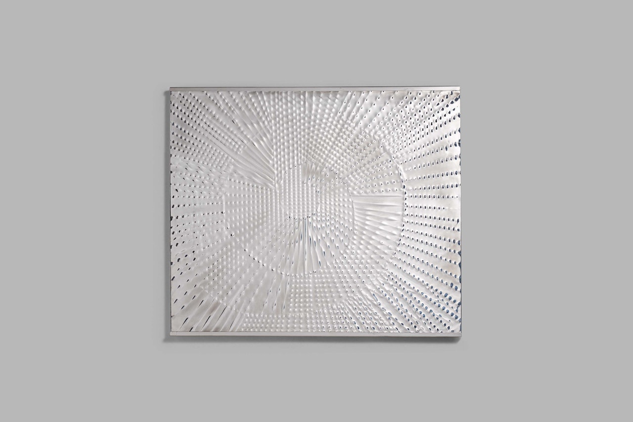 Sonnenrelief. by Heinz Mack