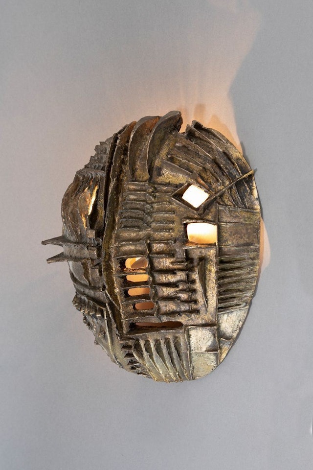 Applique by Arnaldo Pomodoro