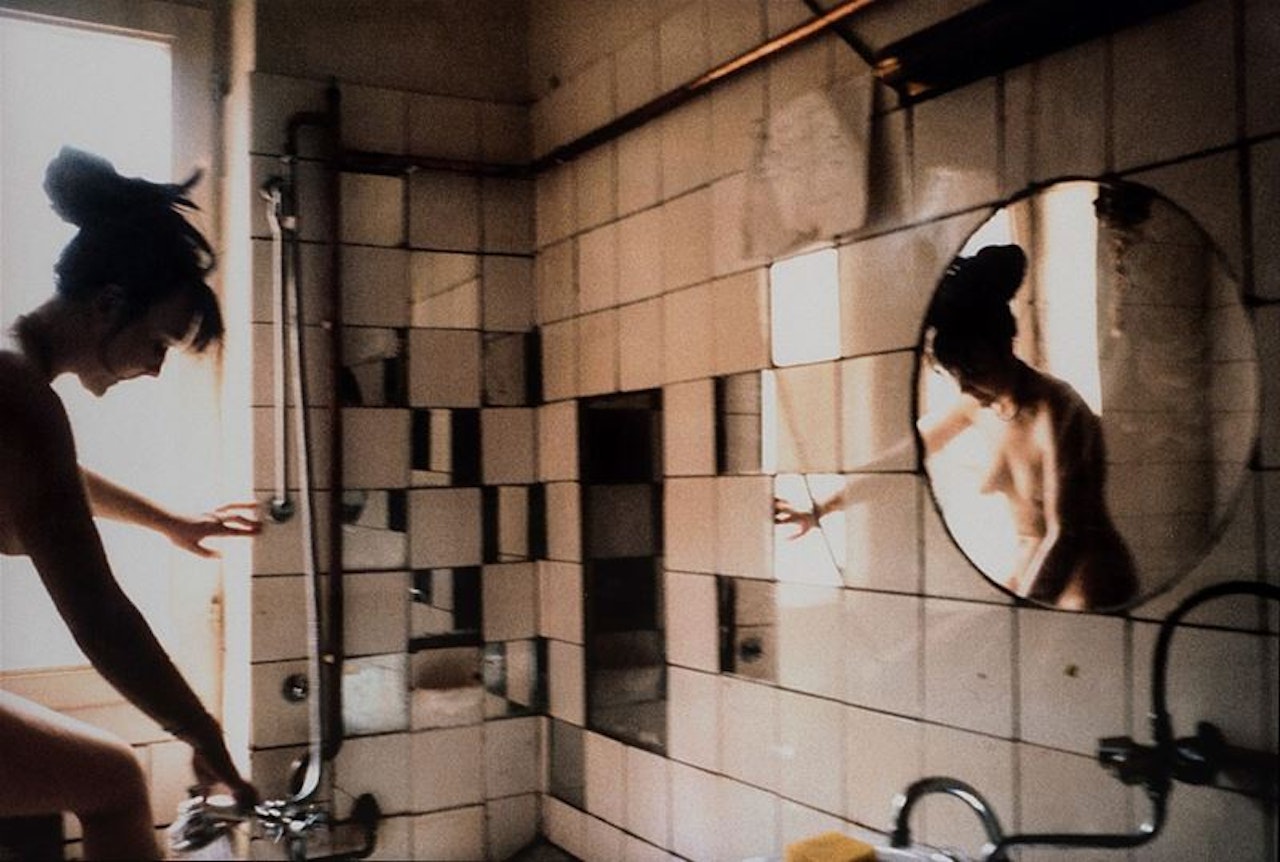 Käthe in the tub, West Berlin by Nan Goldin