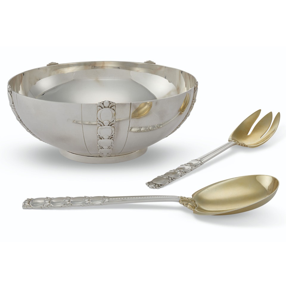 AN AMERICAN SILVER SALAD BOWL AND A MATCHING PAIR OF PARCEL-GILT SALAD SERVERS by Tiffany & Co.