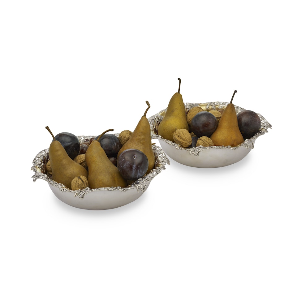 A PAIR OF AMERICAN PARCEL-GILT SILVER BERRY BOWLS by Tiffany & Co.