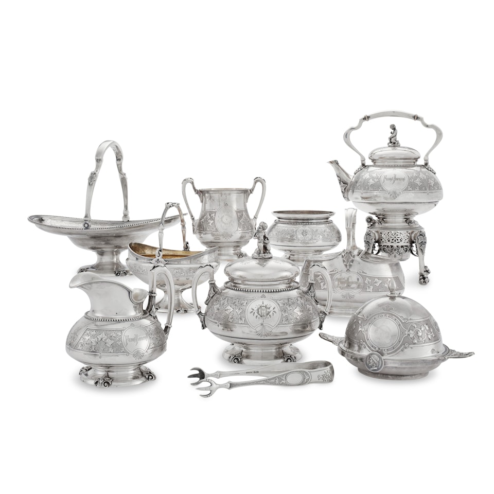 A SUITE OF NINE MATCHING AMERICAN SILVER TEA AND TABLE WARES by Tiffany & Co.