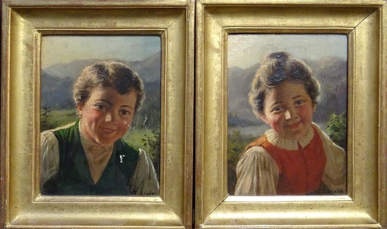 Portrait of a young boy and girl smiling by German School