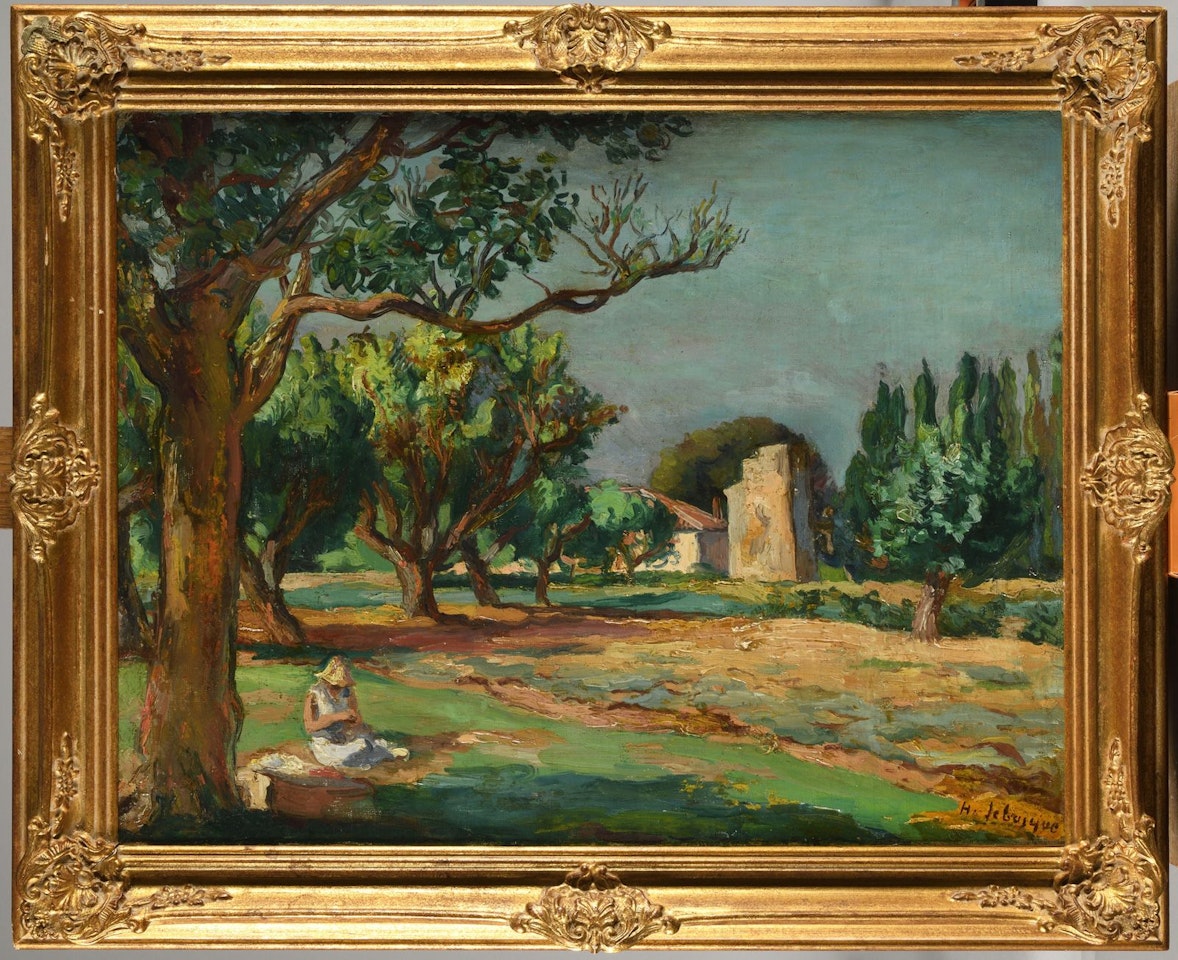 Woman reading in a garden by Henri Lebasque