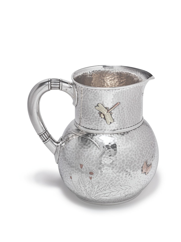 AN AMERICAN SILVER AND MIXED-METAL PITCHER by Tiffany & Co.