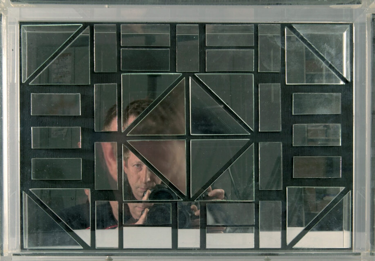 Mirror object by Adolf Luther