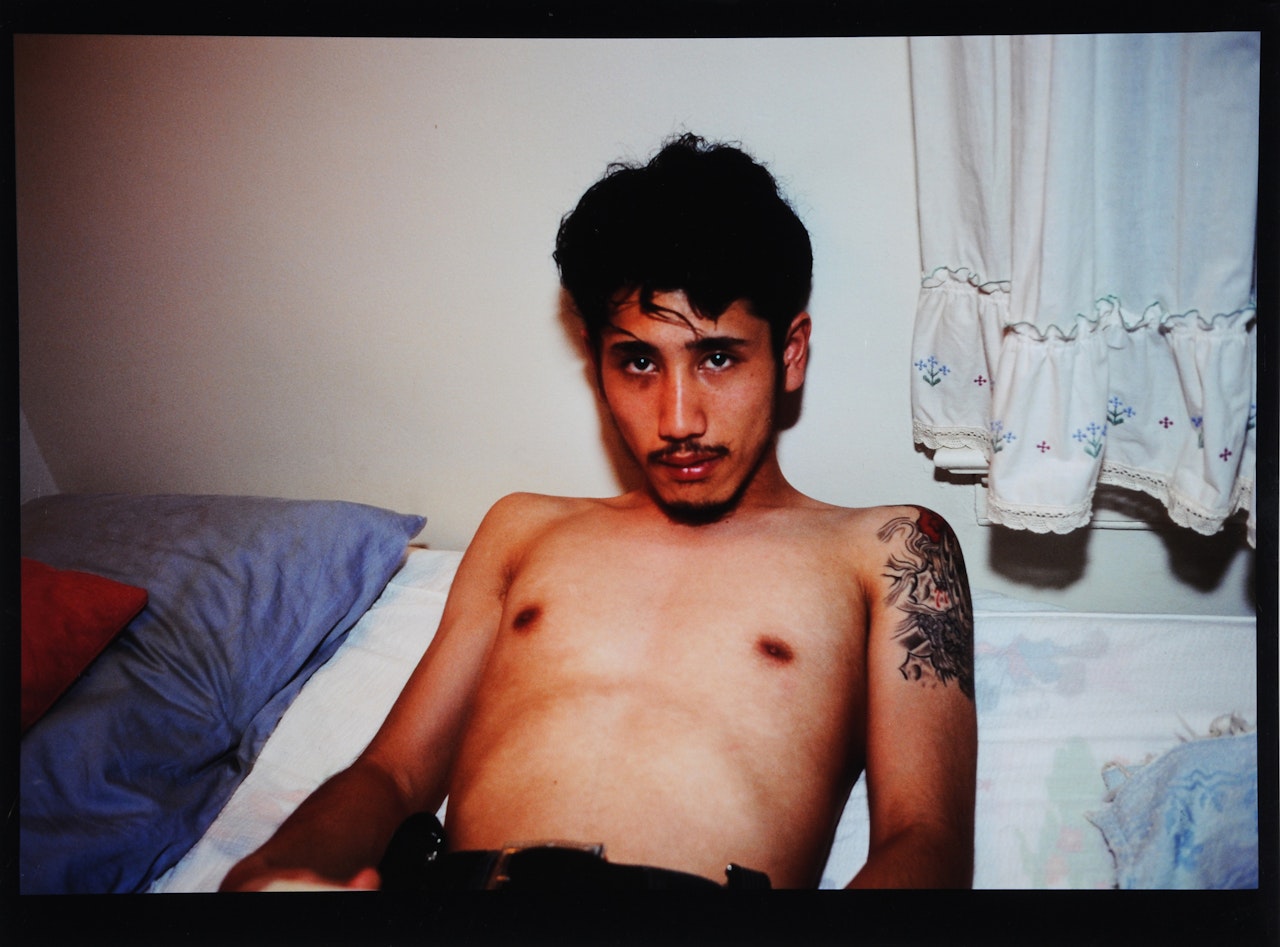 Kee in Bed, E. Hampton, NY by Nan Goldin