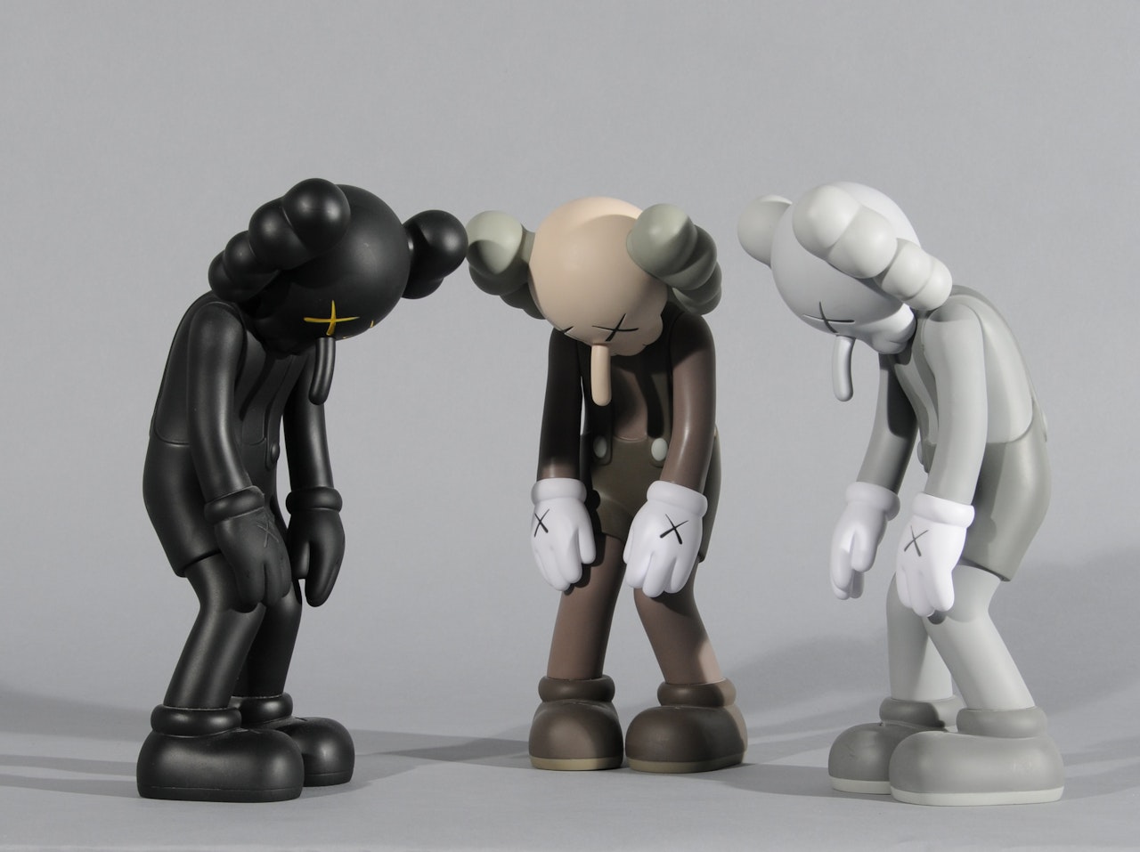 3 multiples: Small lie (Black, Brown, Grey) by Kaws