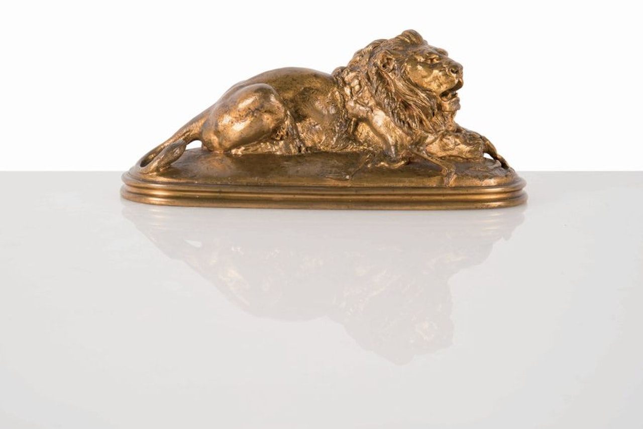 Lion devouring a bushbuck by Antoine-Louis Barye