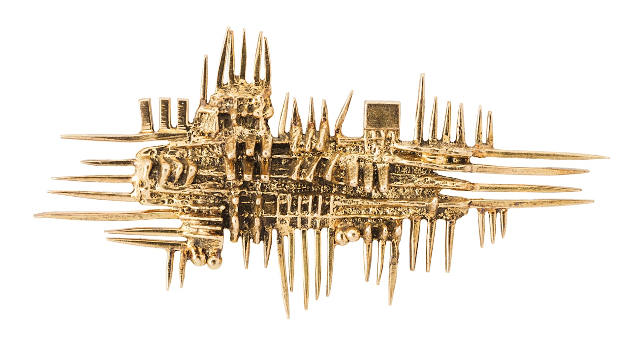 "Brooch" by Arnaldo Pomodoro