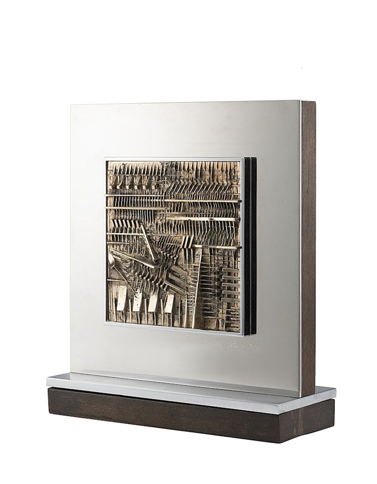 "Bas-relief" by Arnaldo Pomodoro