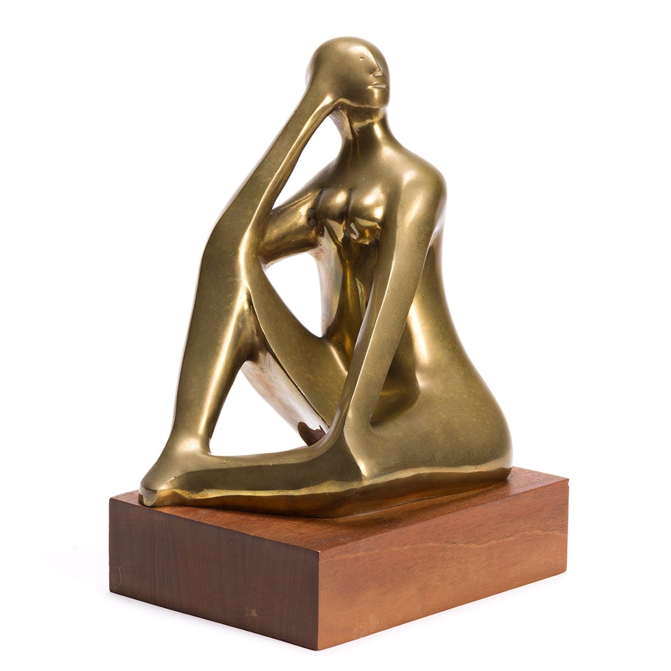 Triangular Woman. by Elizabeth Catlett