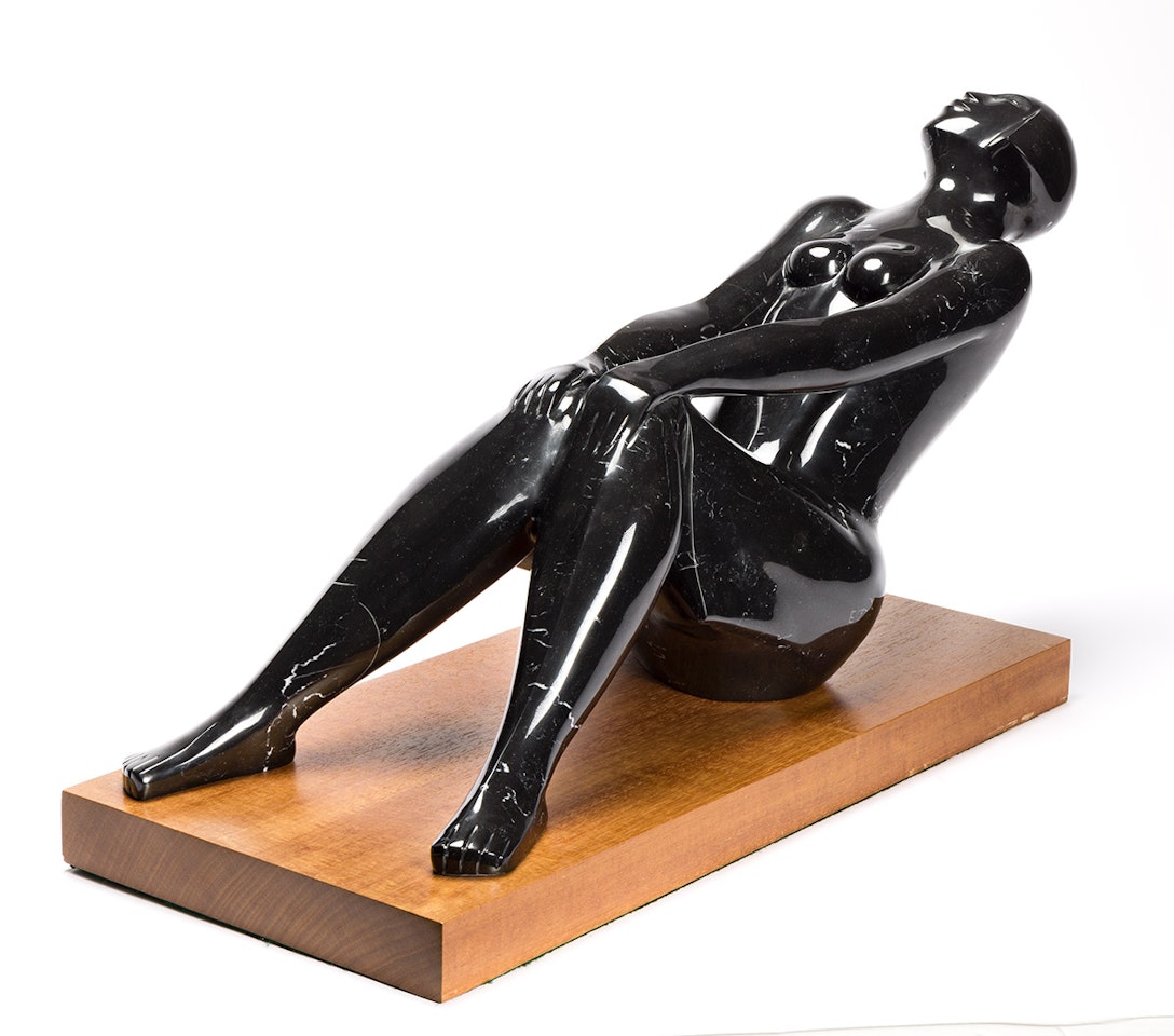 Reclined Figure . by Elizabeth Catlett