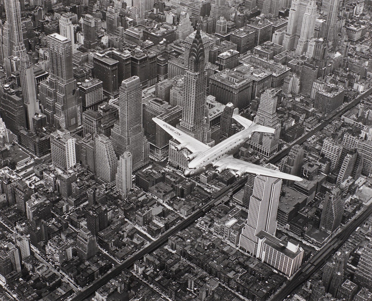 A DC-4 Flying Over New York City by Margaret Bourke-White