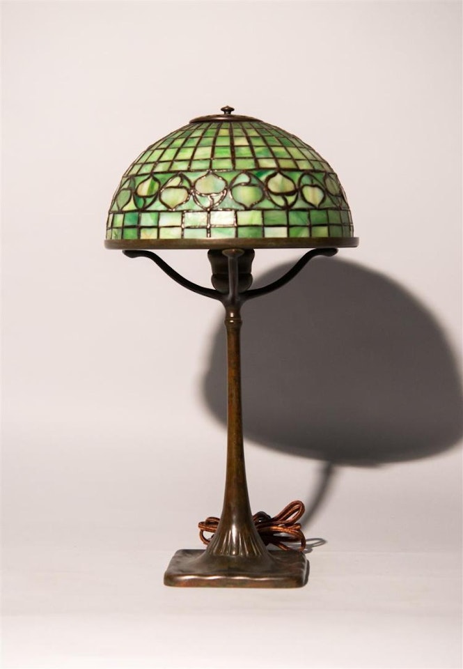 LEADED GLASS AND BRONZE DESK LAMP by Tiffany Studios