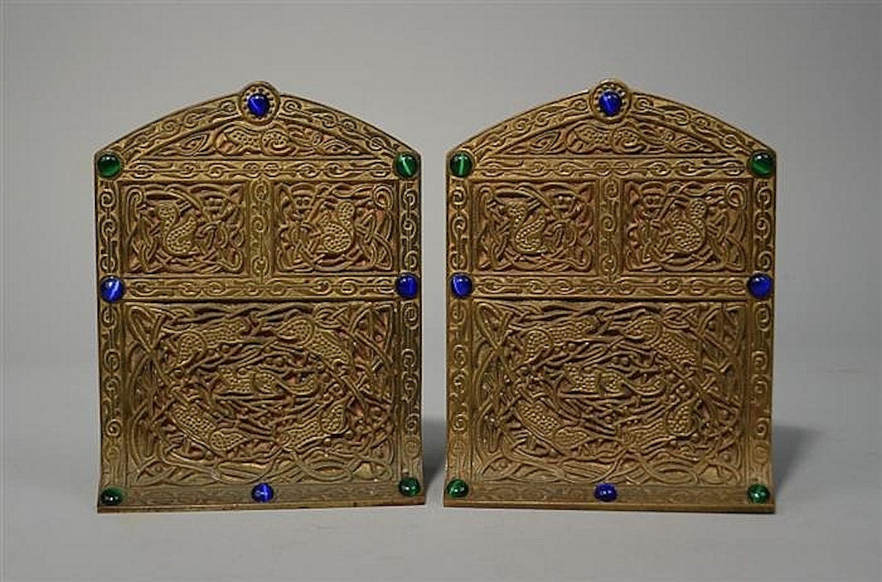 PAIR OF TIFFANY STUDIOS GILT BRONZE AND GLASS BEAD INSET BOOKENDS by Tiffany Studios