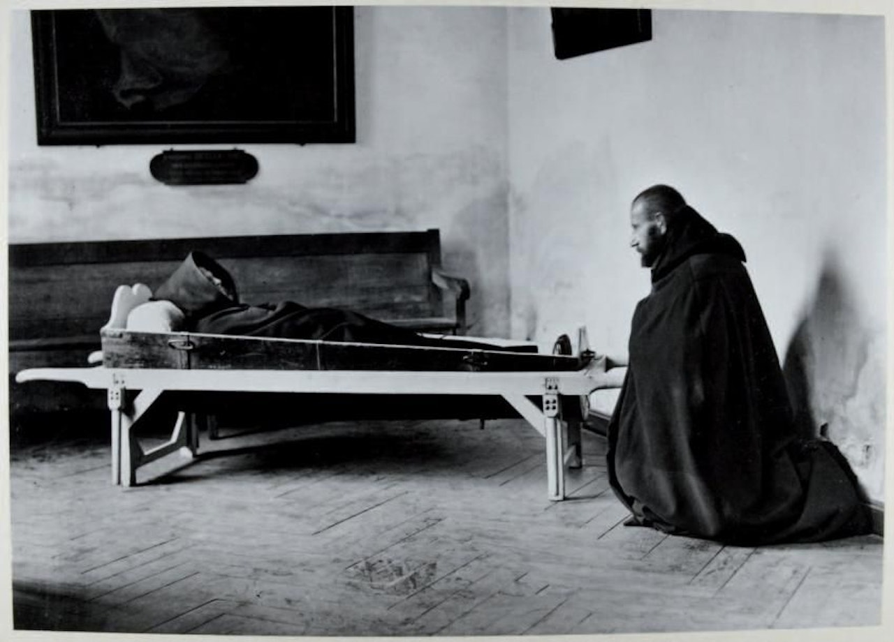 Grieving Franciscan monk by André Kertész
