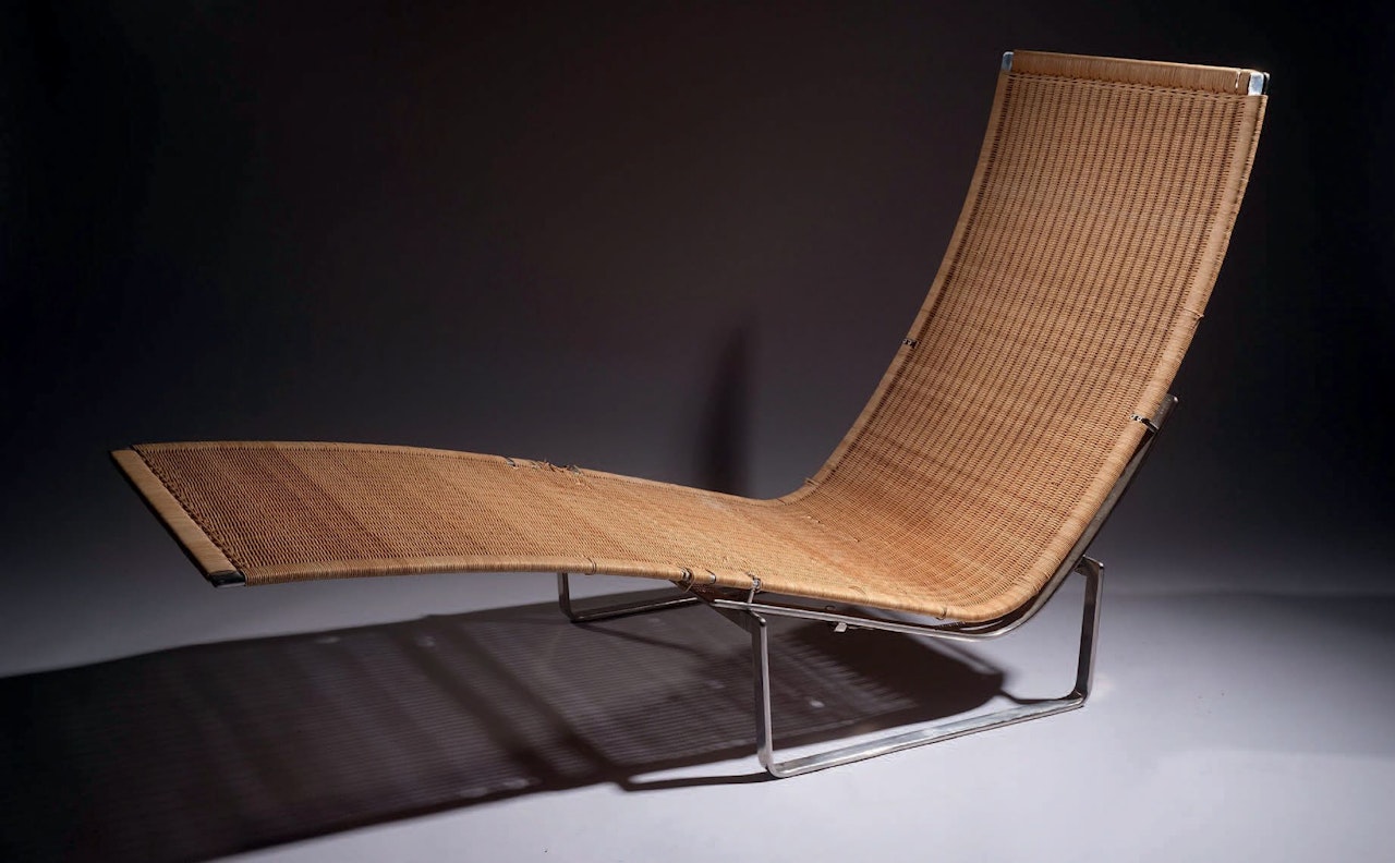 Lounge chair PK24 from the artist"s reference list by Poul Kjaerholm
