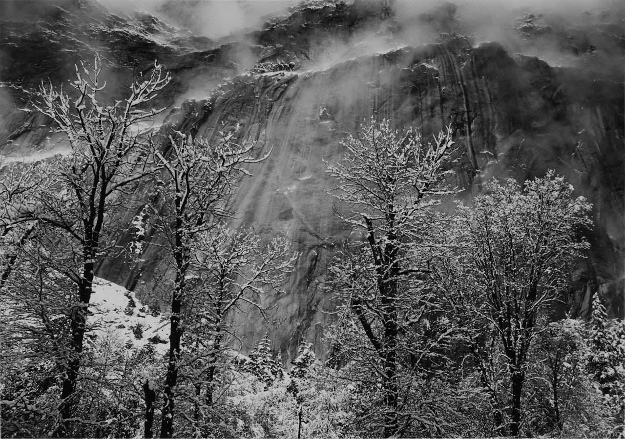 ‘Trees and Cliffs of Eagle Peak, Winter, Yosemite National Park" by Ansel Adams