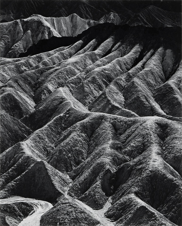 ‘Zabriskie Point, Death Valley National Monument, California" by Ansel Adams