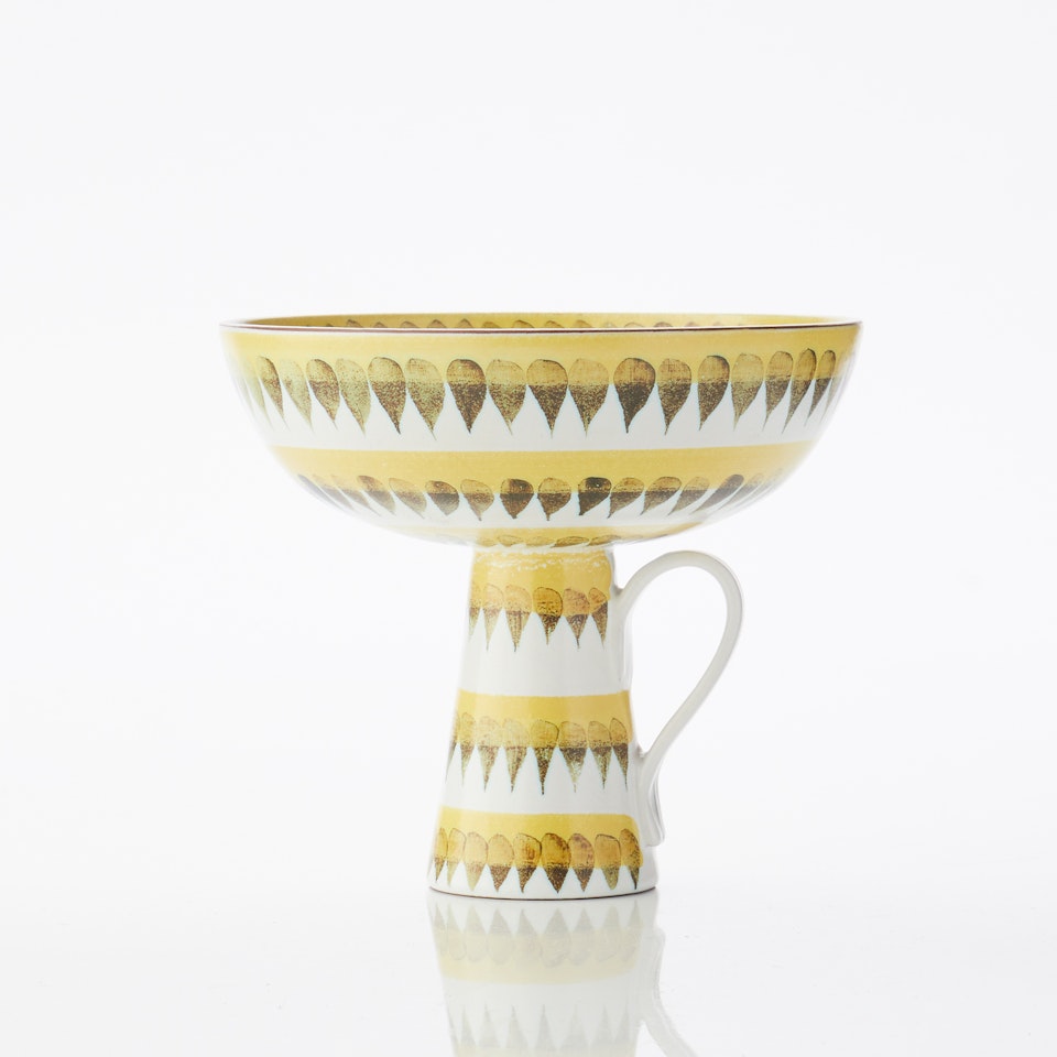 Bowl on foot with handle by Stig Lindberg