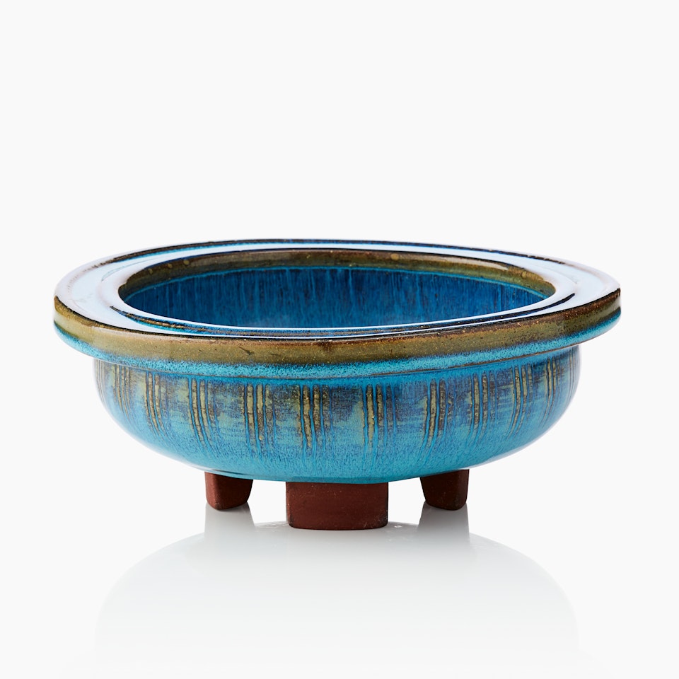 Bowl on four feet. Grandfather"s goods; A Wilhelm Kåge "Farsta" stoneware bowl on four feet by Wilhelm Kage