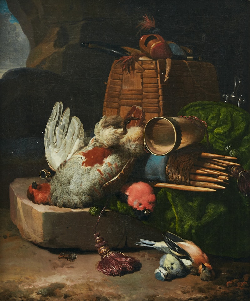 A hunting still life with a partridge, finches and hunting tools on a stone ledge by Melchior de Hondecoeter
