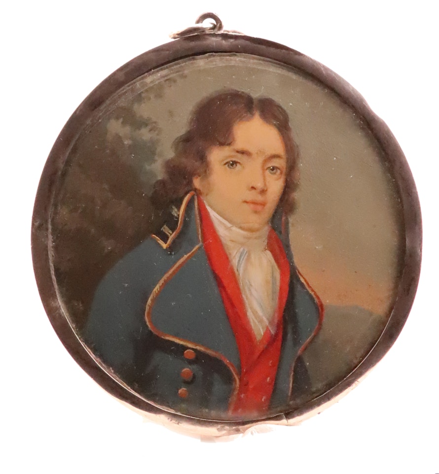 Portrait miniature of a young man, half length, wearing a blue coat and a red waistcoat by English School