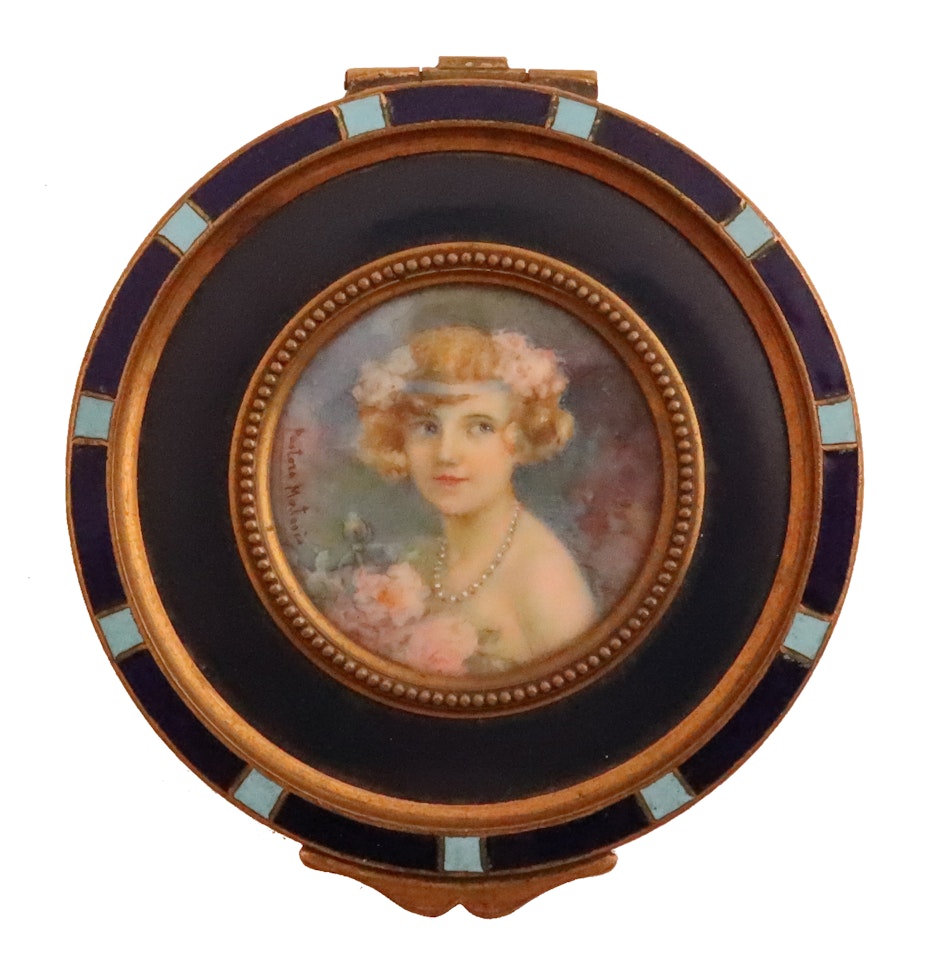 Portrait miniature of a lady, bust length, holding roses by Continental School