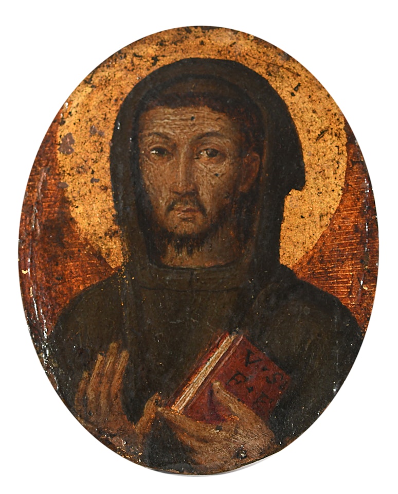 Miniature of a saint in monk"s habit holding a book by Russian School