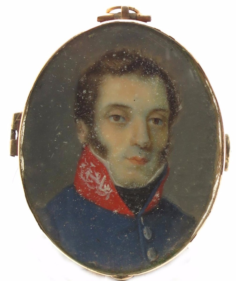 Portrait miniature of an officer in blue uniform with red collar by Continental School