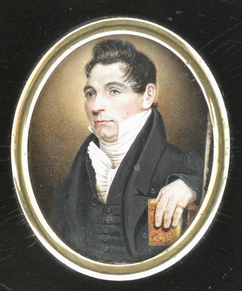 A gentleman, half length, facing left, holding a book in his left hand by English School