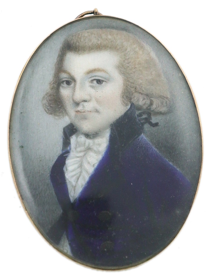 Portrait miniature of a gentleman wearing a blue coat and powdered wig by English School