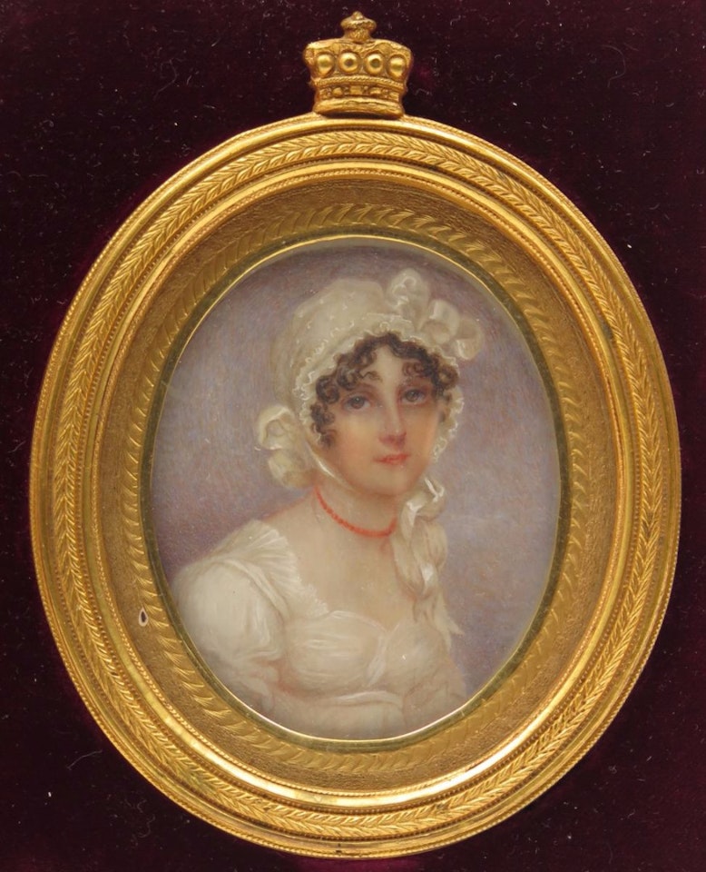 Portrait miniature of Eliza, wife of Thomas Baron le Despencer (d.1848), head and shoulders, wearing white with a coral necklace by English School