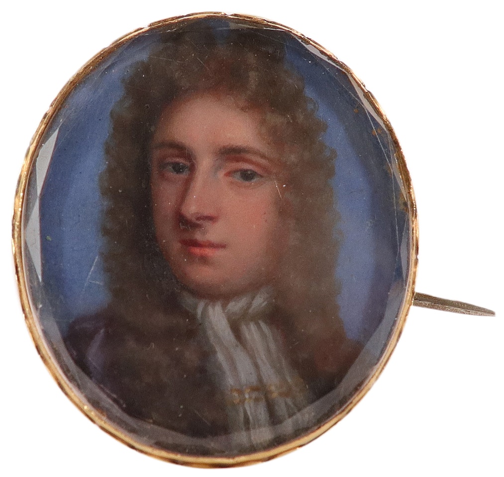 Portrait miniature of a gentleman wearing a cravat and long wig by English School