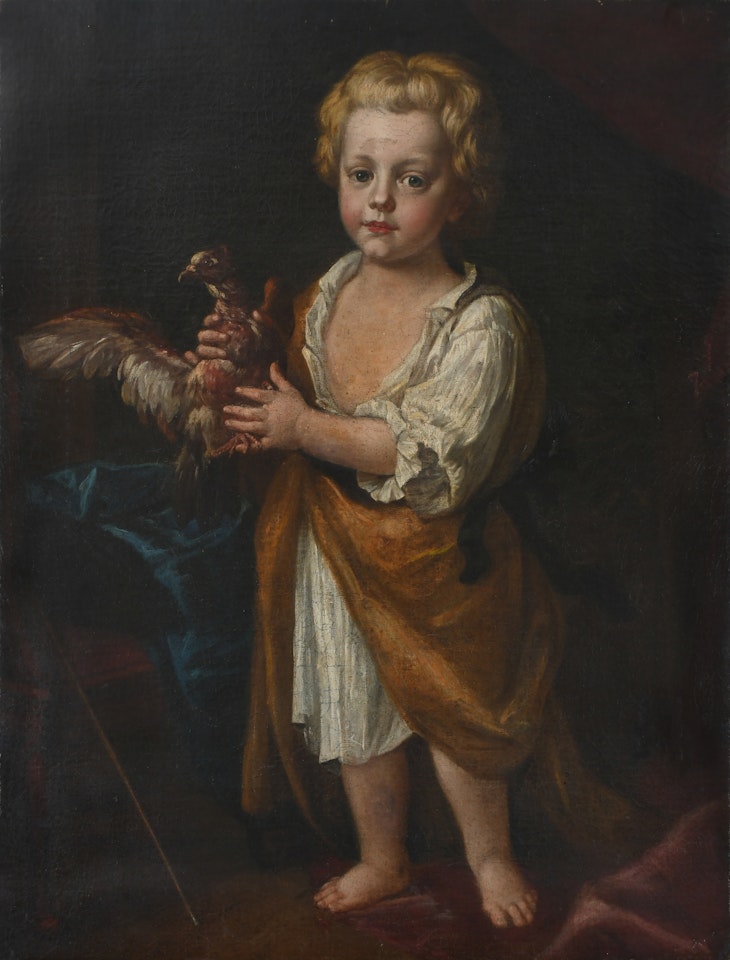 Portrait of a young boy, full length, standing in an interior holding a bird by English School