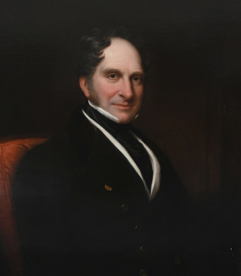 Portrait of a gentleman, half-length, seated in an interior by English School