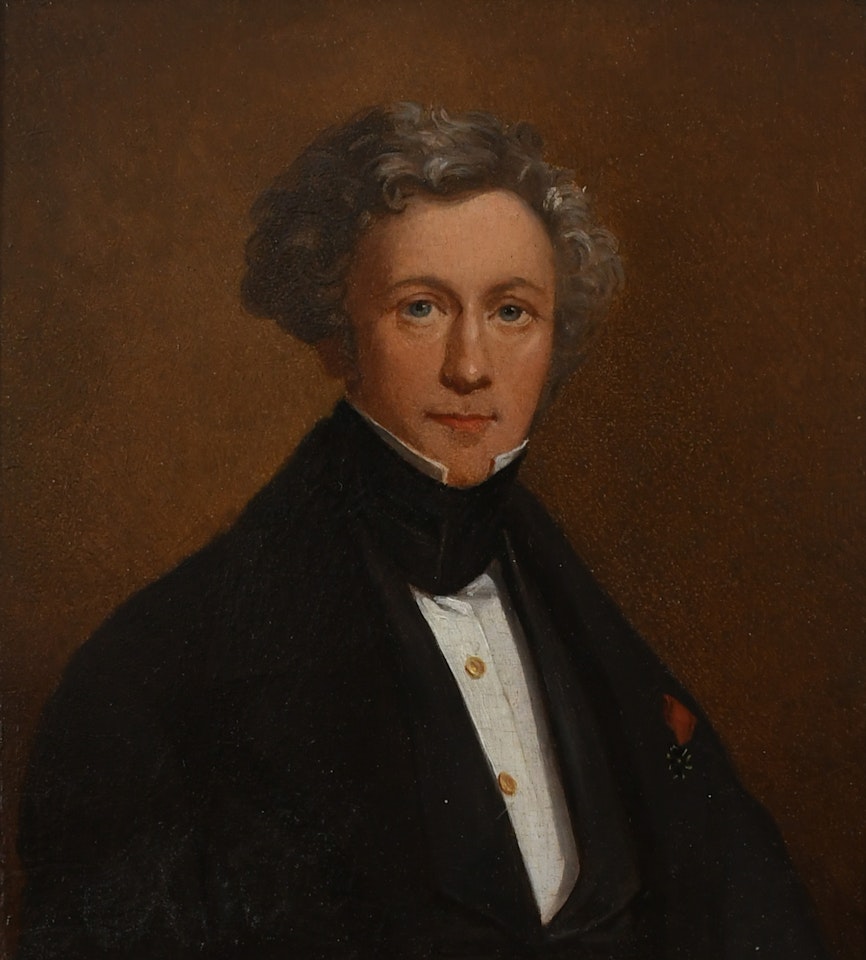 Portrait of a gentleman wearing a black coat and a medal by Continental School