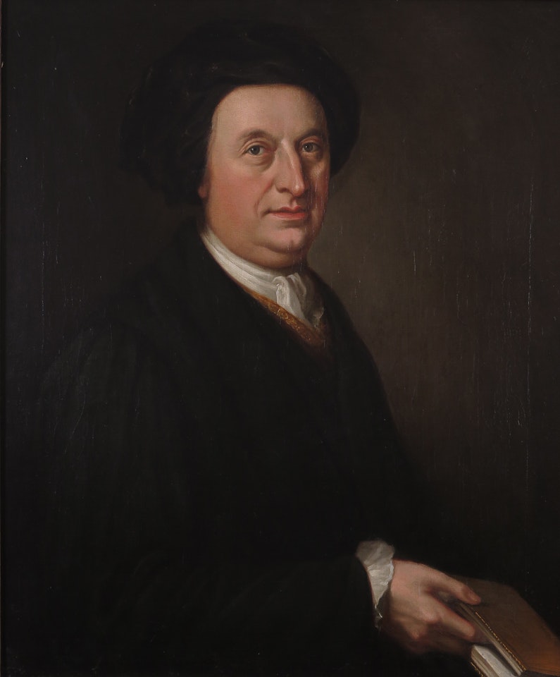 Portrait of a gentleman seated, holding a book, wearing a dark turban by English School