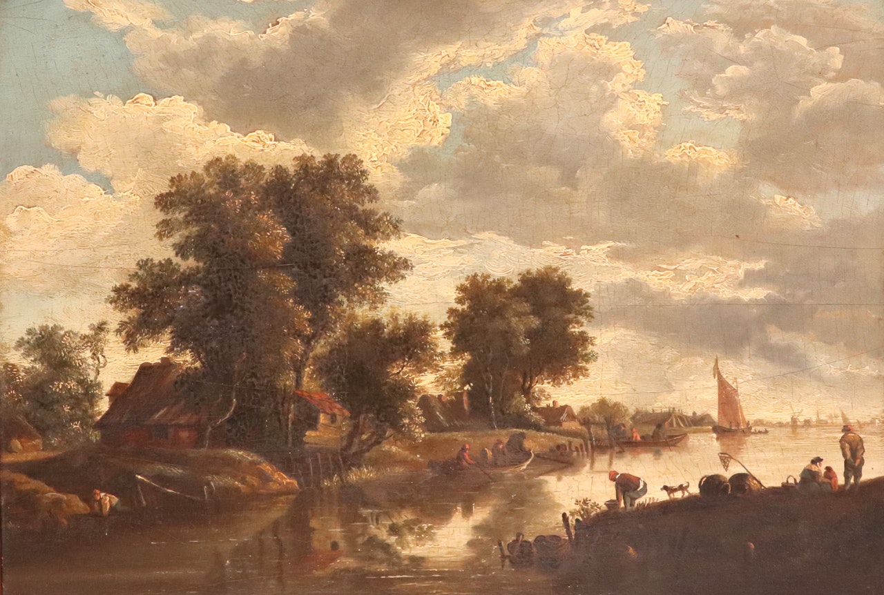 Figures fishing and boating in a river landscape by Dutch School