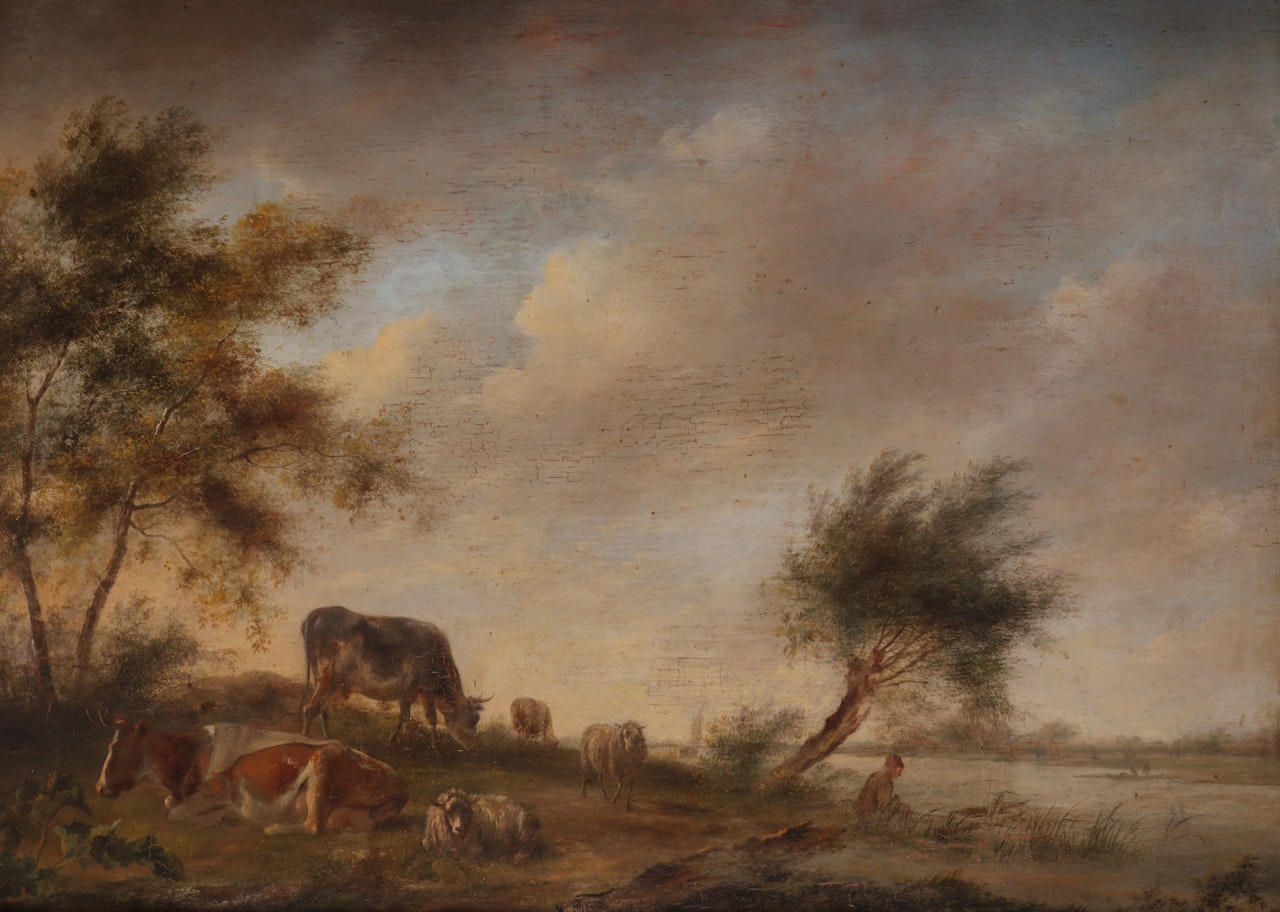 Cattle and sheep with an angler by a river by Dutch School