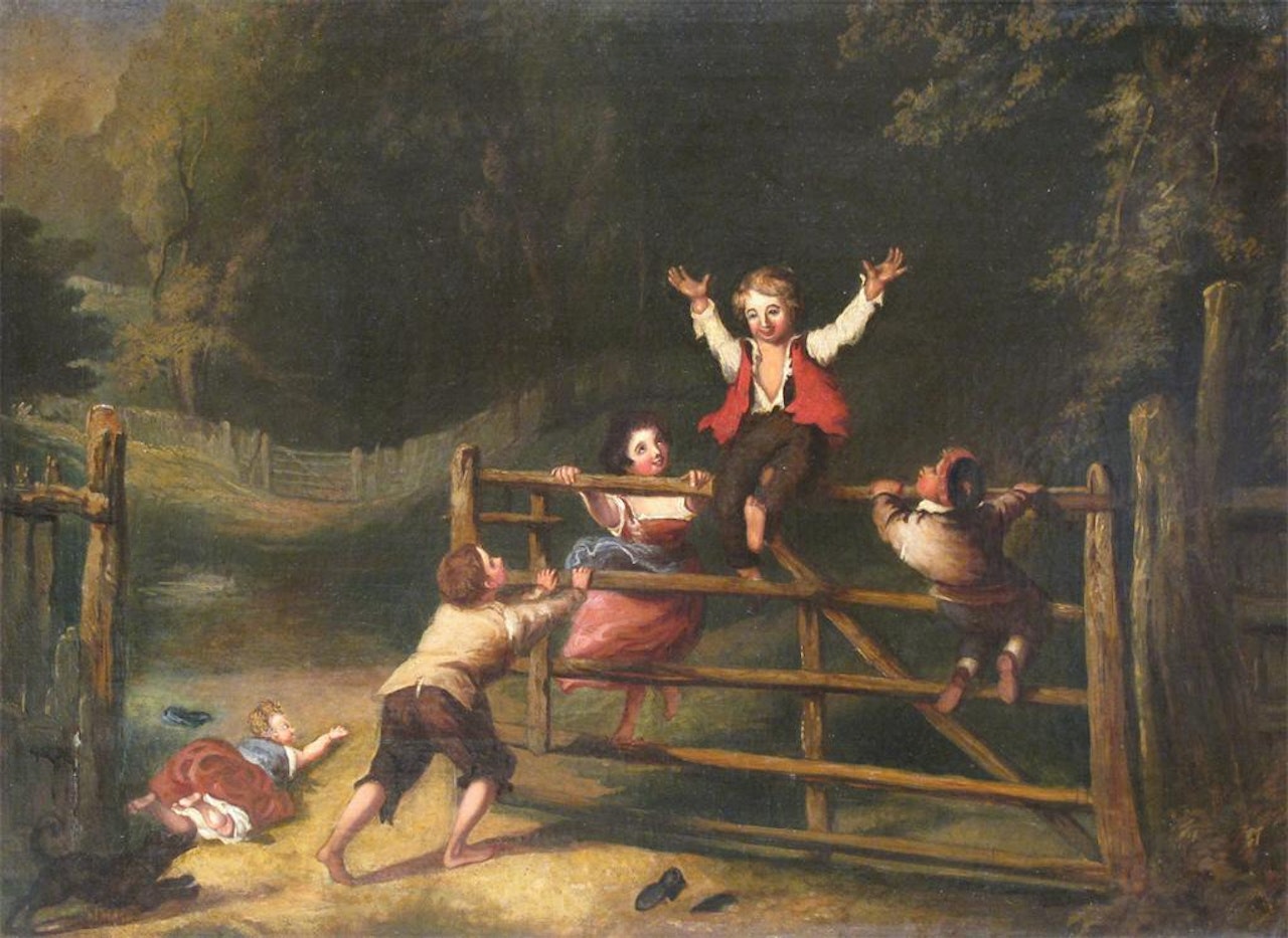 Children playing on a gate by English School