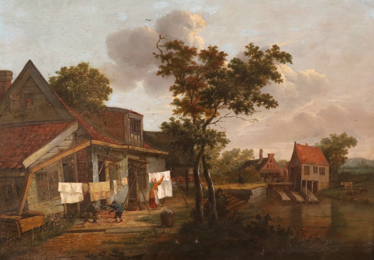 Hanging out the laundry, a cottage by a watermill by Dutch School