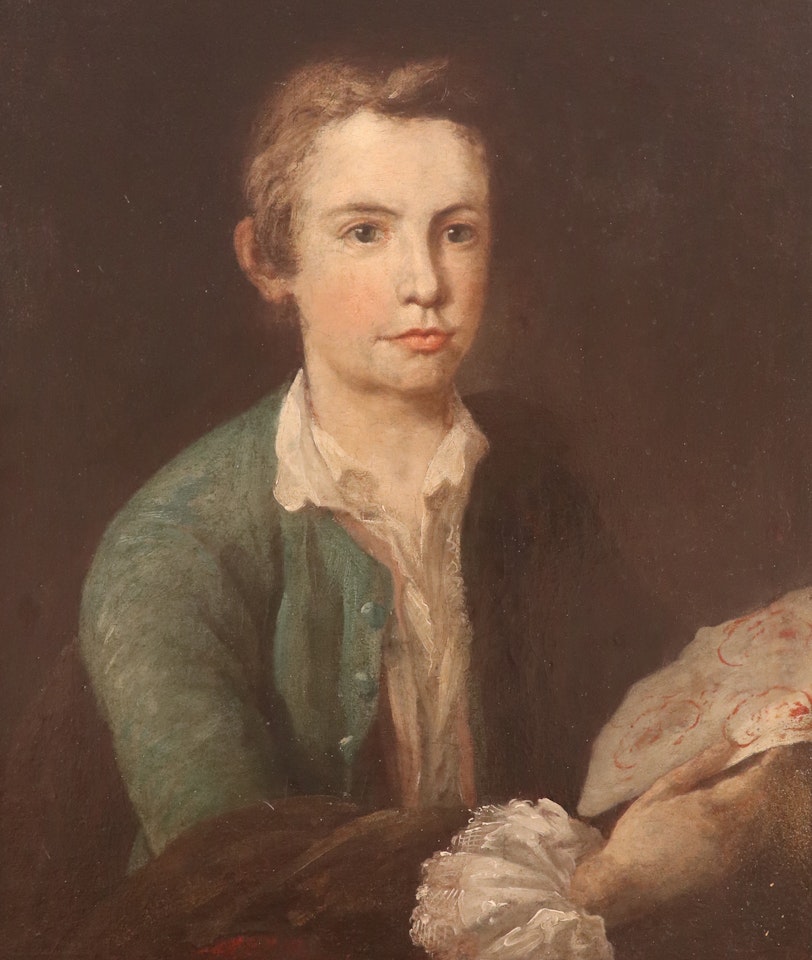 Portrait of a young man, half length, wearing a green jacket by English School