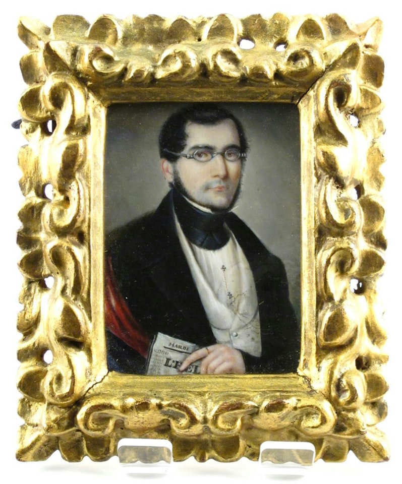 A gentleman, half length, wearing black coat holding a newspaper by French School