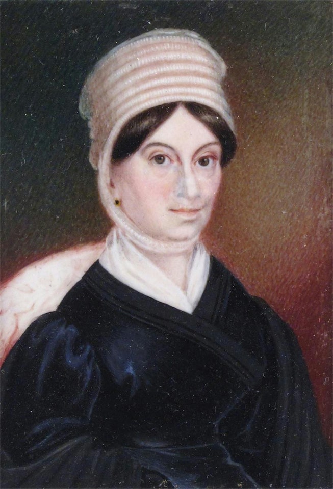 A lady, half length in a black dress by English School