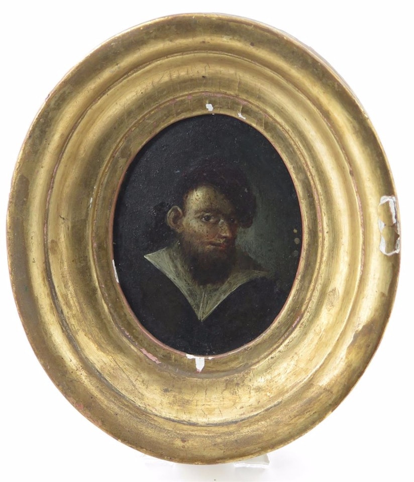 A rustic in a beret by Dutch School