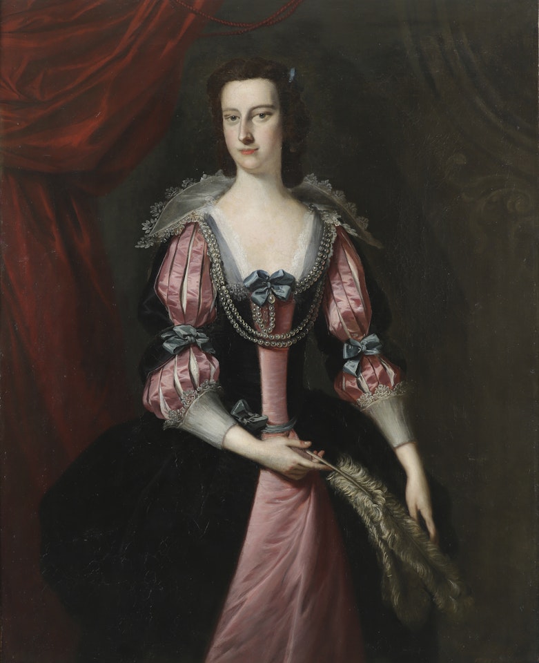 Portrait of a lady, three-quarter length in a pink and black dress holding ostrich feathers by Thomas Hudson