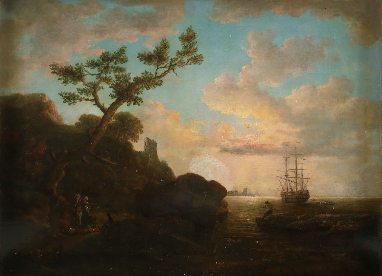 Coastal landscape with figures on the shore around a camp fire, shipping and a port in the distance by English School