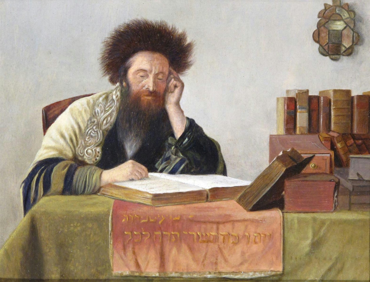 A Rabbi seated at his desk by Continental School